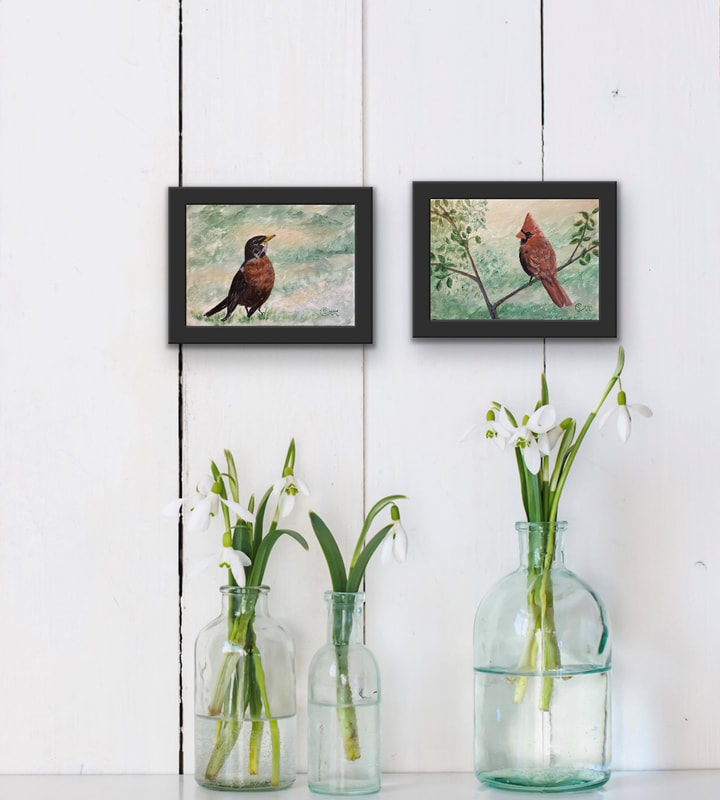 A Robin and a Cardinal, 2 paintings by Susie Caron, displayed as a pair.